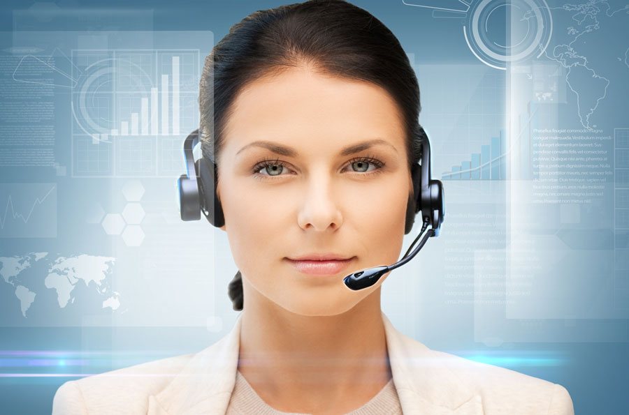 receptionist with headset on surrounded by digital graphics